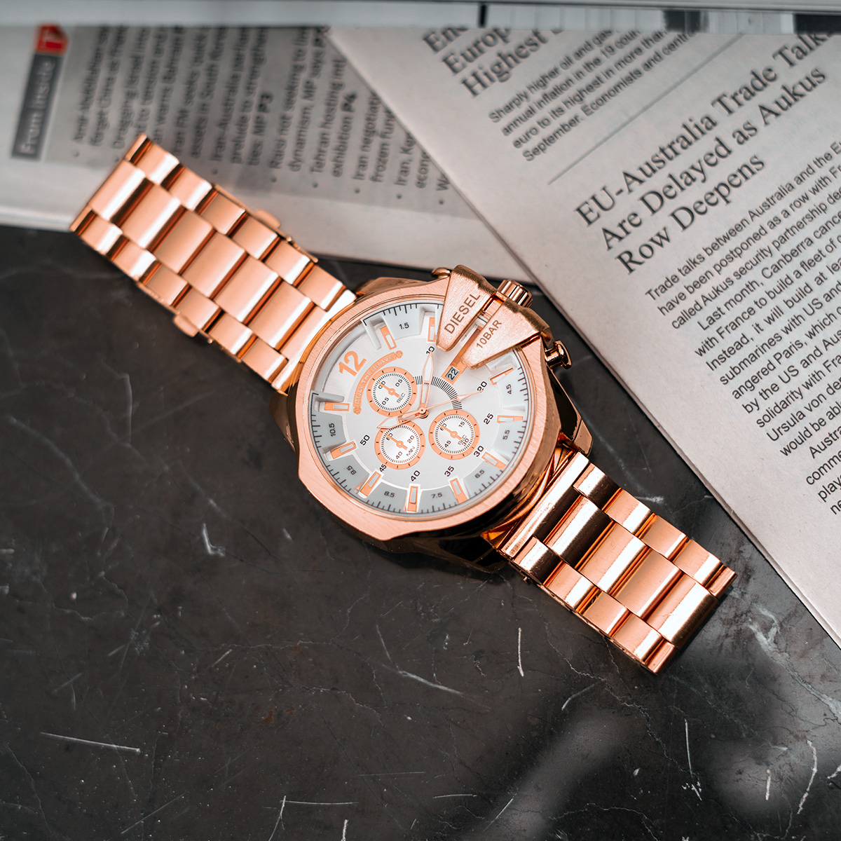 ساعت مچی DIESEL مردانه رزگلد صفحه سفید مدل U700