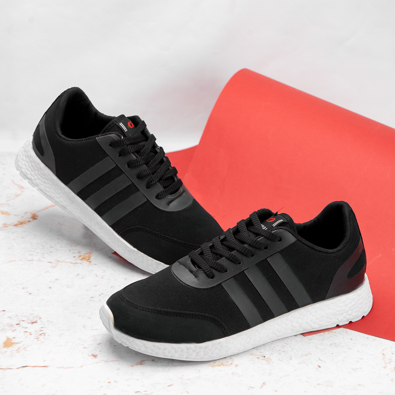 کفش ورزشی آدیداس مردانه مشکی زیره سفید مدل Hami