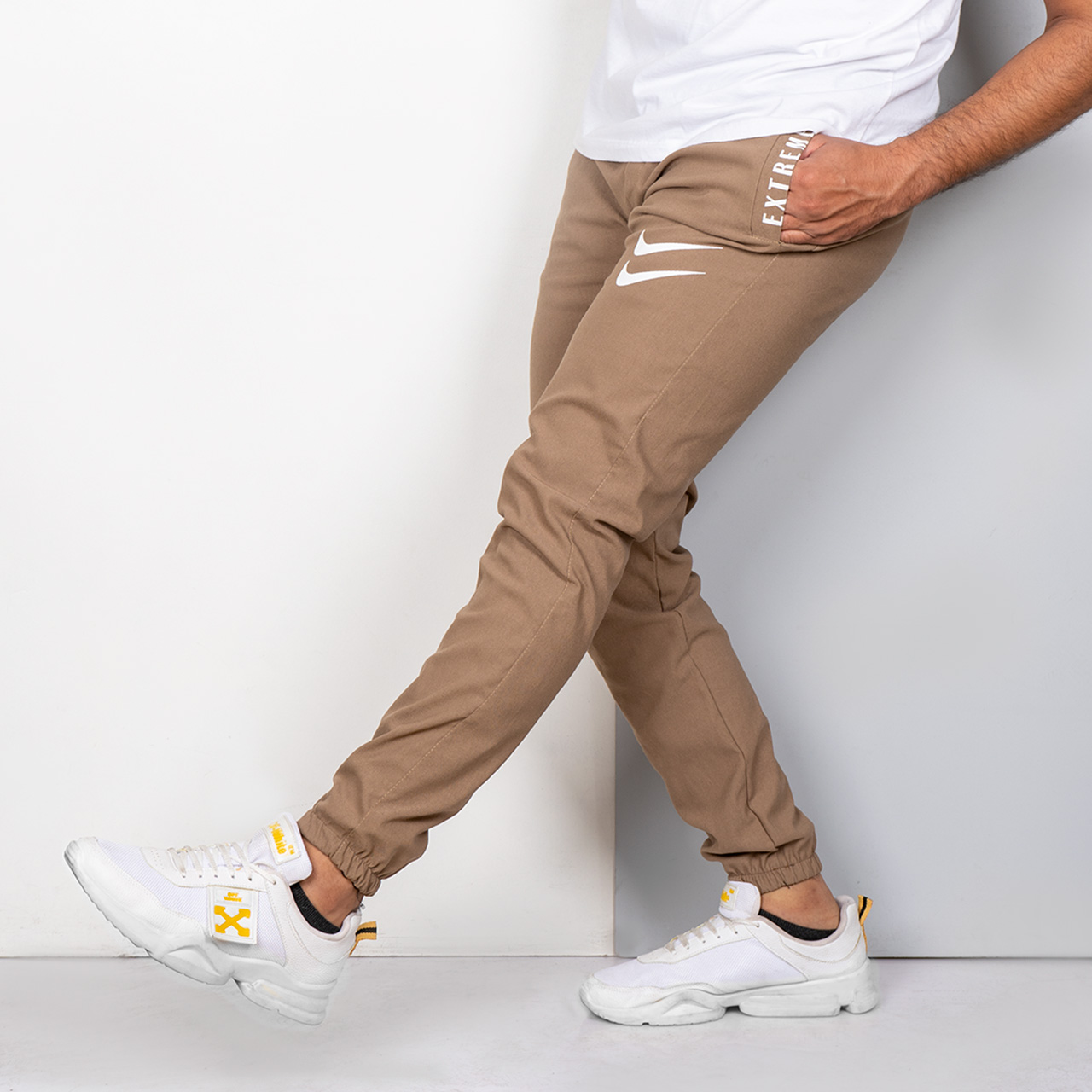 شلوار اسلش نایک کرم مردانه مدل manio