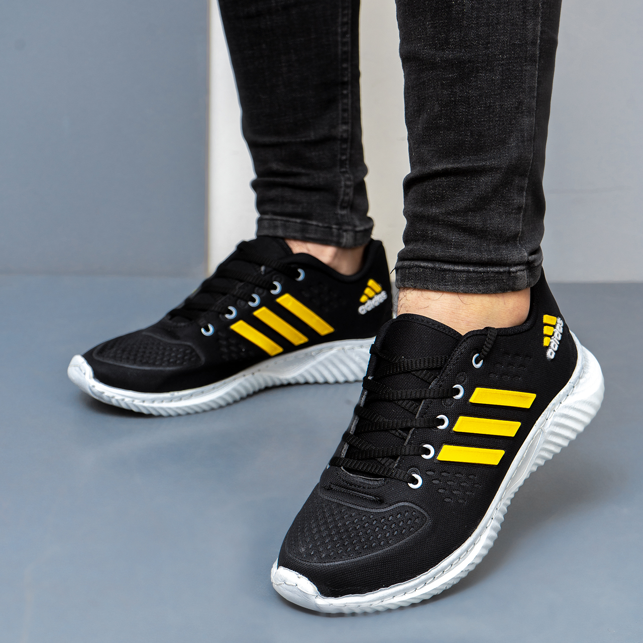 کفش ورزشی سه خط زرد-مشکی (T) مردانه مدل Y99